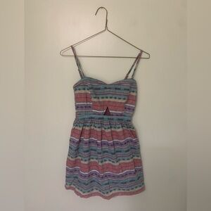 Vans — women’s patterned short dress with cut out window detail